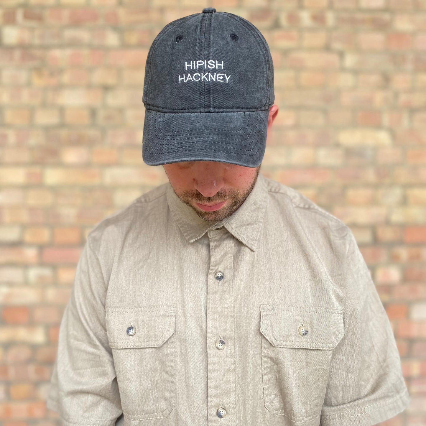 ‘Hipish Hackney’ Recycled Cotton Cap in Washed Charcoal Black - One Size